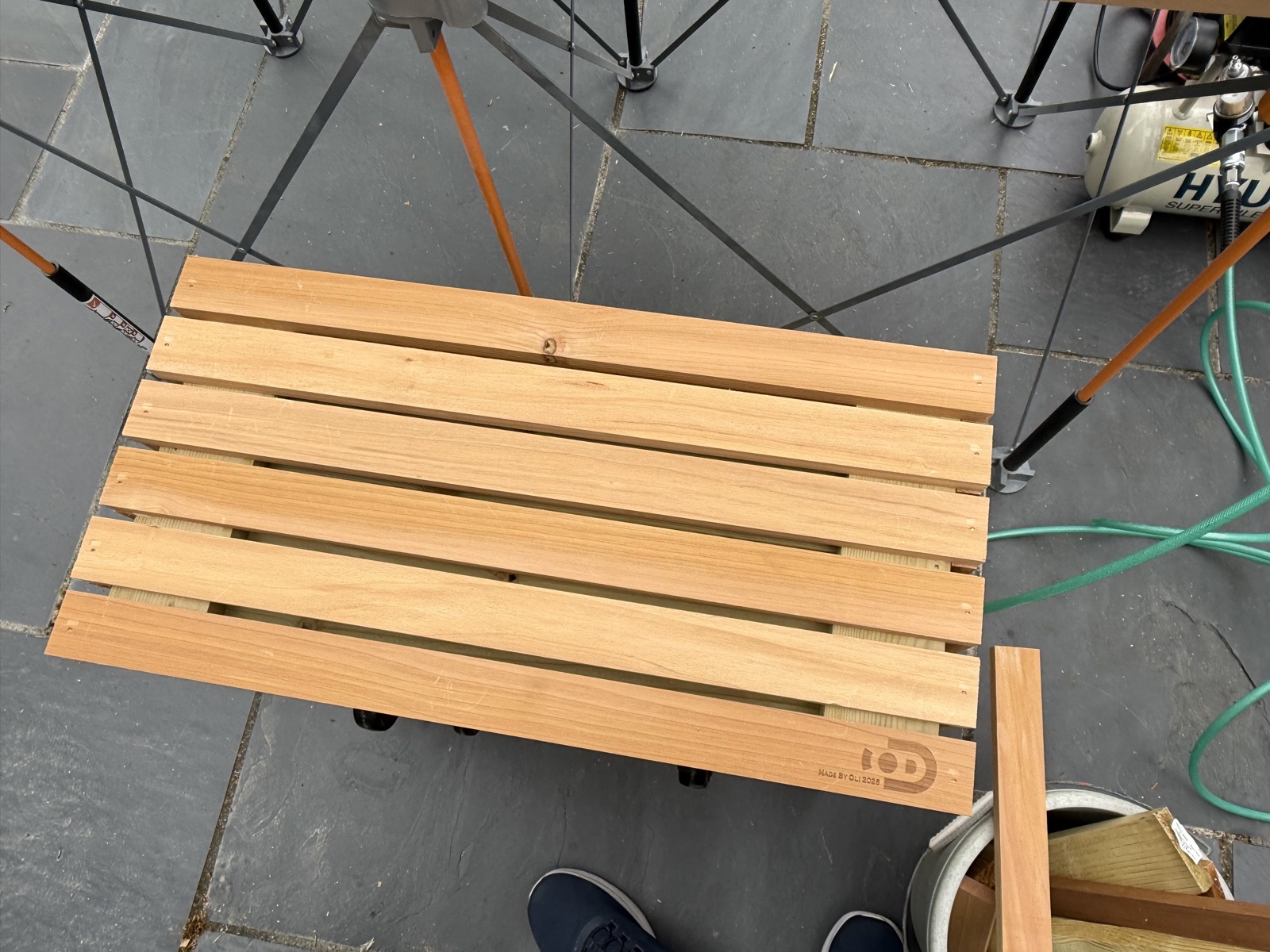 All four sides clad, top lip boards laid out for fitting